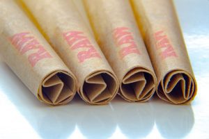 Calgary, Alberta, Canada. Sep 16, 2020. Close up of four RAW Pre-rolls cannabis papers with filters Tips or Roach Papers.
